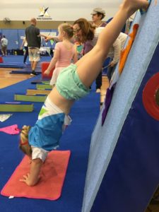 Kids learning handstands - fundamental gymnastic skill
