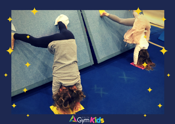 Kids gymnastics learning handstands - Delta Gymnastics Brisbane, Gold Coast & Barron Valley
